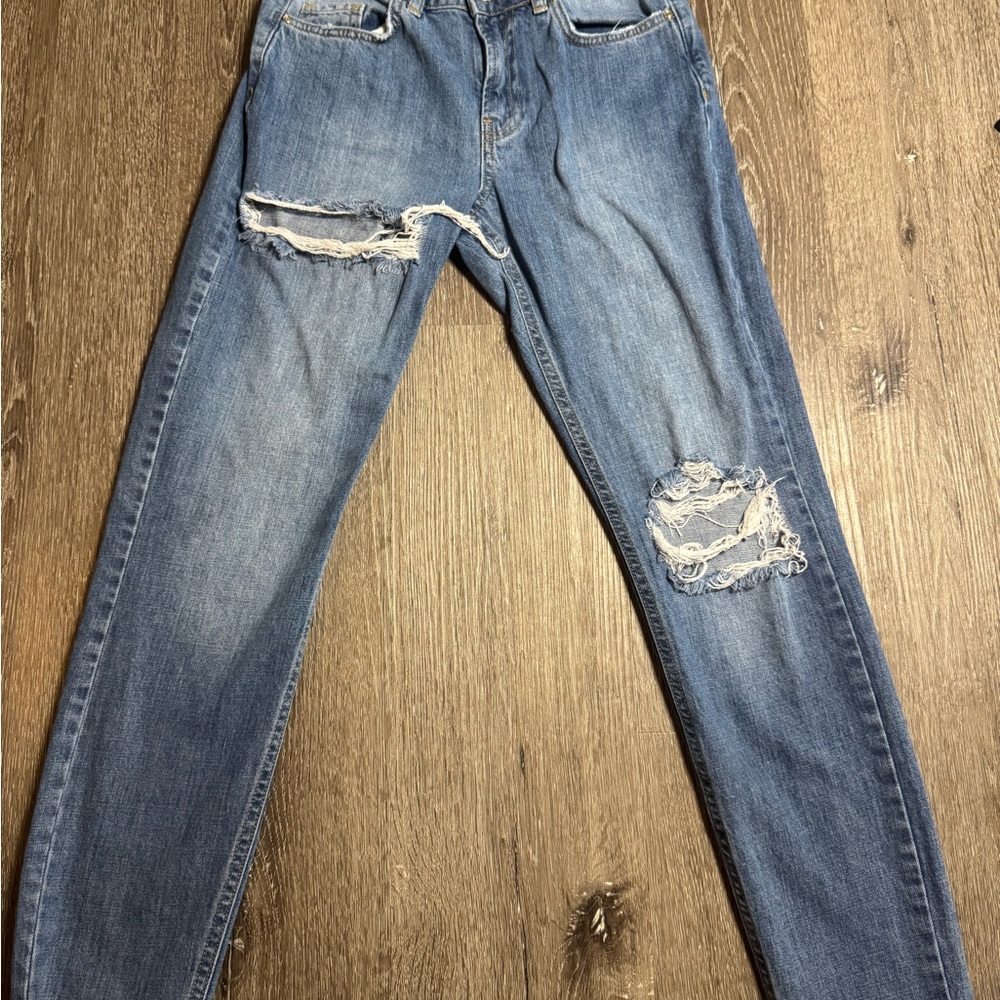 Distressed Blue Denim Jeans